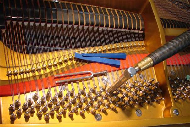 Tuning hammer in grand piano